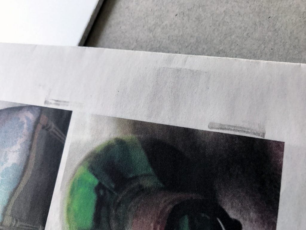 Klammerabdrücke beim Zeitungsdruck